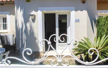 Nice home in Oliva w/ WiFi Outdoor swimming pool and 2 Bedrooms