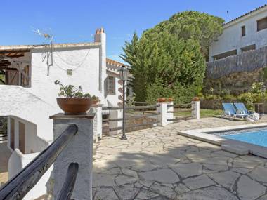 Ibicenca villa on a hill in a residential area with private swimming pool