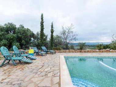 A beautifully restored farmhouse with a private pool in the mountains