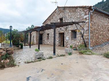 A beautifully restored farmhouse with a private pool in the mountains