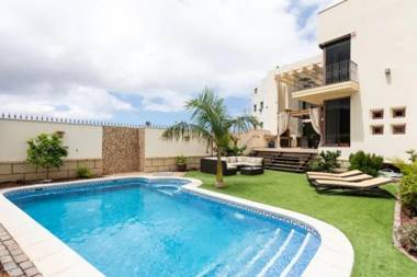 4 bedrooms villa with sea view private pool and enclosed garden at Adeje 3 km away from the beach