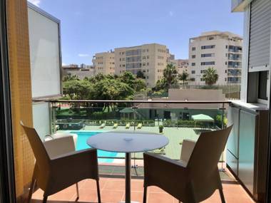 Apartment with extensive gardens PARKING GYM terrace and pool