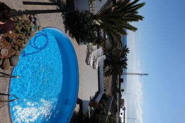 Nice little house with pool seaview big sunterrace for 4 pers.