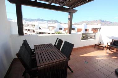 Palmera apartamento con balcón azotea y piscina comunitaria