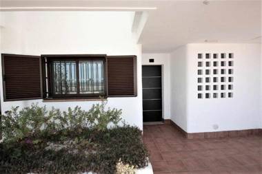 Casa Hermanos apartamento cerca de la playa con piscina compartida