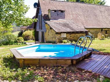 Pleasant cottage with swimming pool large garden playground and beautiful view.