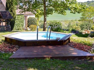 Pleasant cottage with swimming pool large garden playground and beautiful view.
