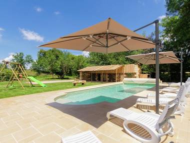 Spacious farmhouse with private heated pool in a rustic garden.