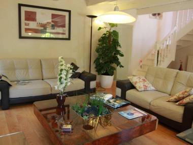 17th century Breton cottage with modern interior on the edge of a forest.