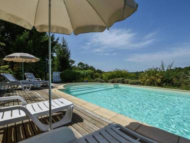 Holiday home in the woods with private swimming pool and lovely terrace.