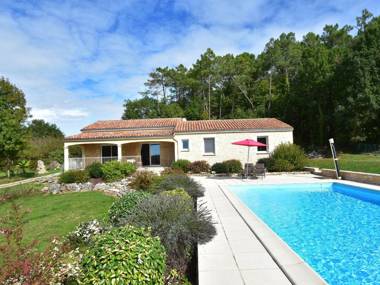 Holiday home in Montcléra with sunny garden playground equipment and private pool