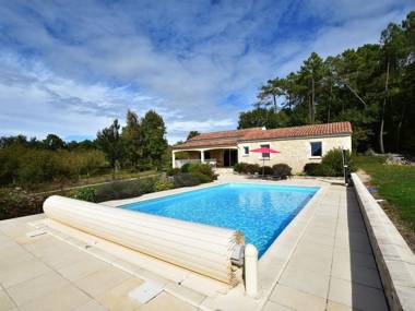 Holiday home in Montcléra with sunny garden playground equipment and private pool