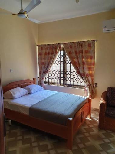 EXECUTIVE APARTMENT 2 master ensuite bedrooms 3 toilets 3 baths hot water air conditioned separate fitted kitchen separate living room large compound 24hr security electric fenced wall restaurant bar WIFI about 20 minutes from the airport