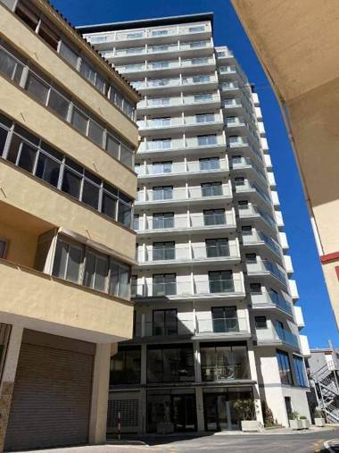 Studio with a balcony facing the rock near the beach and city centre