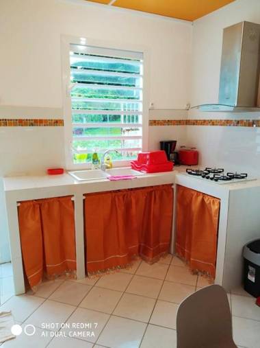 Maison d'une chambre avec piscine partagee terrasse amenagee et wifi a Petit Bourg