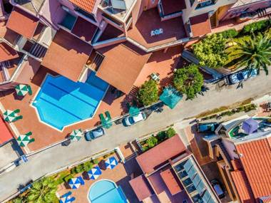 Theos Village Apartments