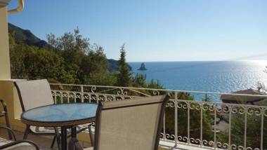 Natalia Apartment A with panoramic sea views of Agios Gordios bay