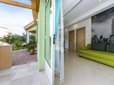 New Luxury Apartment  in a quiet area with private covered  terrace BBQ