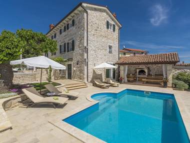 Stone holiday home with private pool and fenced garden near the water park