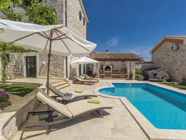 Stone holiday home with private pool and fenced garden near the water park