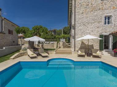 Stone holiday home with private pool and fenced garden near the water park