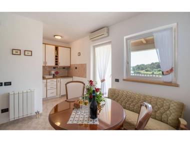 Modern apartment with balcony sea and pool view for a couple in Medulin