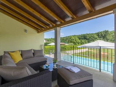 Modern house with pool and beautiful landscaped environment in a quiet location