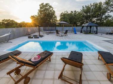 Beautiful villa with private swimming pool nice covered terrace play area BBQ