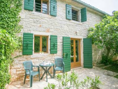 Beautiful holiday Apartment surrounded with a Stone wall with Pool and Garden