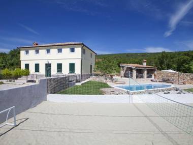 Attractive villa with private swimming pool beach volleyball and fenced garden