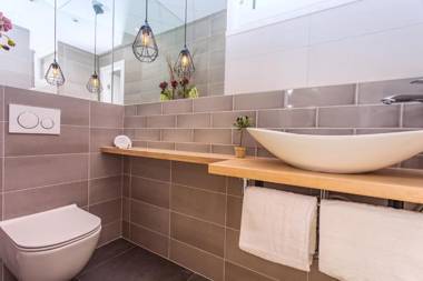 VILLA CVITA is a modern 5-bedroom villa with a Jacuzzi a Gym and Finnish Sauna a heated pool and amazing views