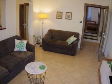 Comfortable apartment with covered  terrace and fenced garden