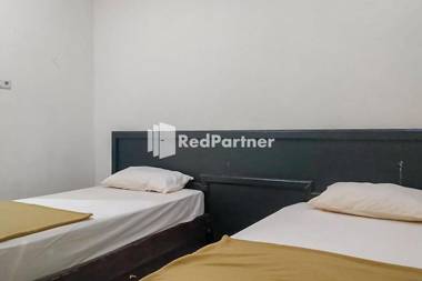 Palu City Guest House RedPartner