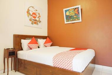 Vaccinated Staff - OYO 408 Graha Vege Jawi Syariah