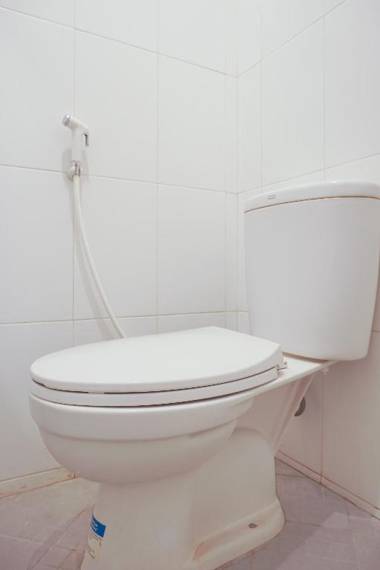 Vaccinated Staff - OYO 408 Graha Vege Jawi Syariah