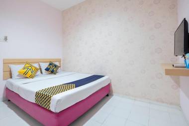 Vaccinated Staff - SPOT ON 2214 Wisma Jampea