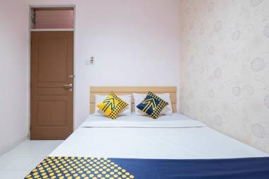 Vaccinated Staff - SPOT ON 2214 Wisma Jampea