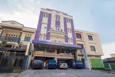 Vaccinated Staff - Capital O 3380 Erin Int Hotel