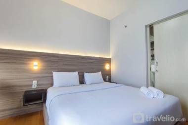 Comfort 1BR at Amartha View Apartment By Travelio