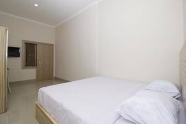 RedDoorz near Jalan Kolonel Haji Burlian Palembang