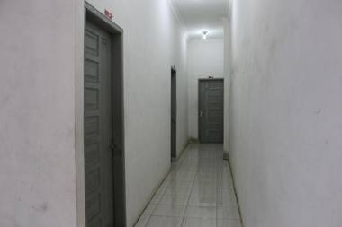 Penginapan Transit Tomato