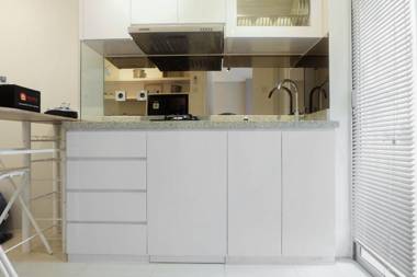 Stylish & Modern 2BR Bassura City Apt By Travelio