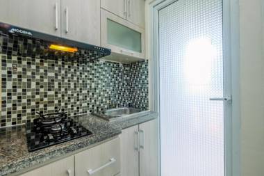 Comfort Green Pramuka 2BR Apartment By Travelio