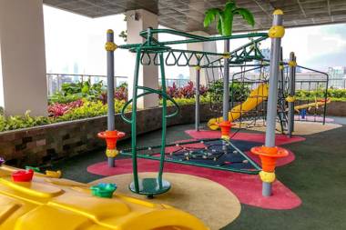 Warm Studio at Menteng Park Apartment By Travelio