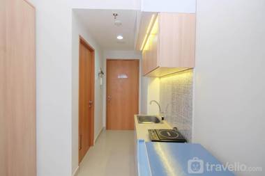 Cozy Studio Evenciio Apartment near UI By Travelio