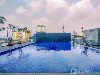 Cozy Studio Evenciio Apartment near UI By Travelio