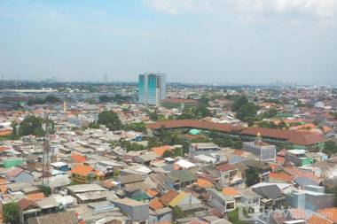 Modern 2BR Bassura City near Mall By Travelio