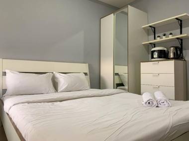Tranquil Living Studio at Belmont Puri By Travelio