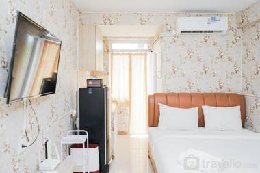 Homey Studio at Green Palm Residence By Travelio