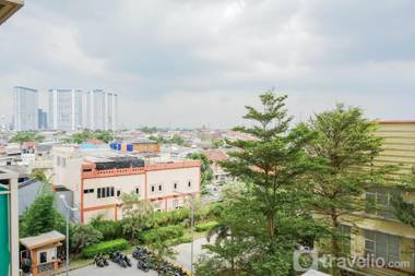 Homey Studio at Green Palm Residence By Travelio